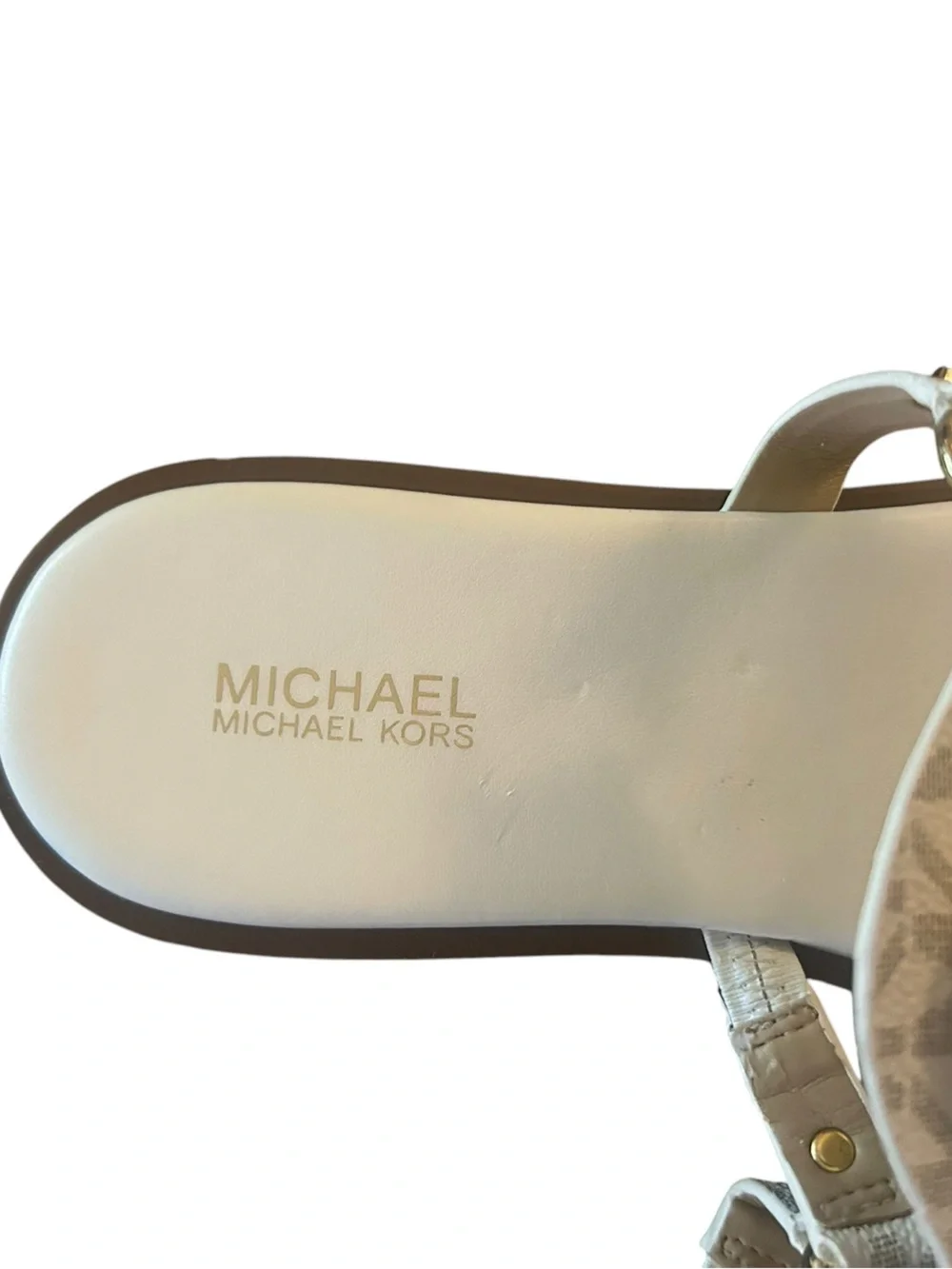 Michael Kors Signature Logo T-Strap Sandals Featuring The Iconic MK Logo  In Gol